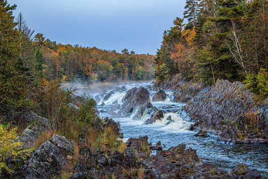 The roaring water as the Bad River cuts through the colorful fall trees in Wisconsin